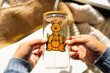 Load image into Gallery viewer, A heartwarming bamboo sticker featuring a kangaroo mother and her baby, enhancing the charm as it graces a glass cup. 🦘💚 #KangarooSticker #BambooArt #WildlifeCharm
