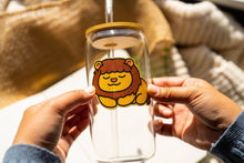 Load image into Gallery viewer, Lion bamboo sticker on a glass cup, showcasing the majestic king of the jungle in a unique and artistic way. 🦁🌿 #LionBambooSticker #WildlifeArt #MajesticLion
