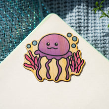 Load image into Gallery viewer, Jellyfish Bamboo Sticker Alt Text: A mesmerizing bamboo sticker featuring a graceful purple jellyfish, surrounded by a vibrant coral reef and playful bubbles, adding a touch of underwater enchantment to your belongings. 🌊💜🐚 #BambooSticker #JellyfishArt #UnderwaterMagic
