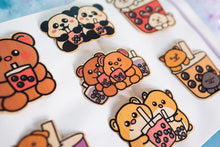 Load image into Gallery viewer, Belugabee Bamboo Stickers: Adorable animal companions meet delightful boba designs – bear, dog, cat, panda, hamster. Elevate your style with these eco-friendly 3x3-inch stickers! 🐻🐶🐱🐼🐹🍵 #BambooStickers #AnimalBobaArt
